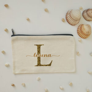 Neceser "Inicial con animal print + nombre" personalizado